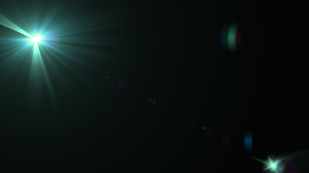 Animation af flere ord, der danner en menneskehjerne over linseflare på sort baggrund