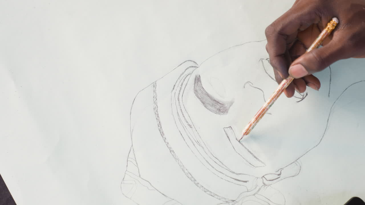 Black portraitist adding tonal lines on paper, closeup view of black hands guiding brush through delicate washes, calm ambient light, introspective pace and refined draftsmanship