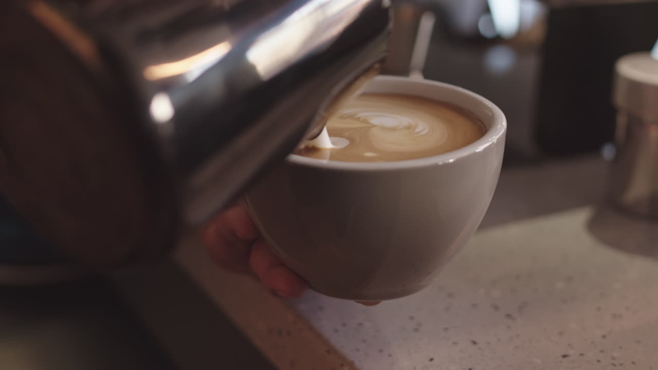 Unrecognizable Barista Making Big Cup of Cappuccino