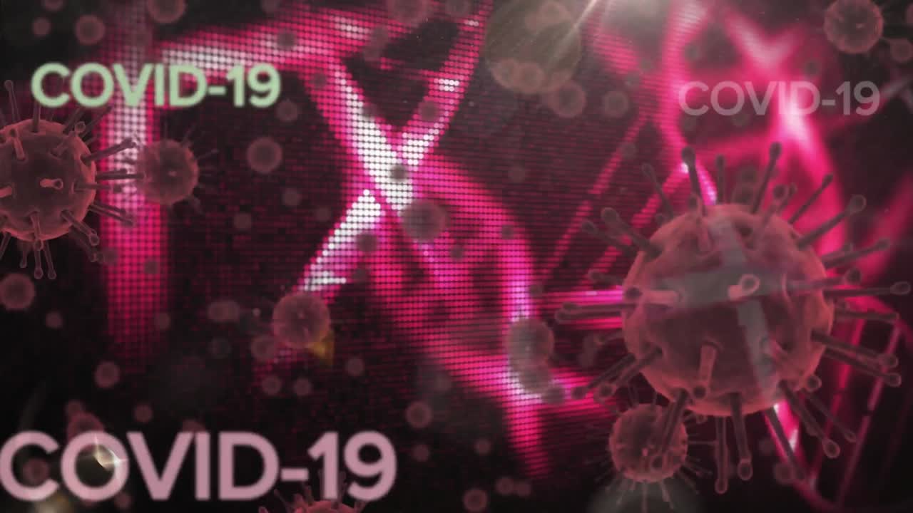 Animation of words Covid-19 floating with macro virus cells