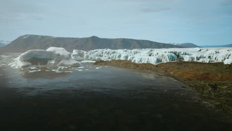 big glacier on the coast of antarctica a sunny summer afternoon