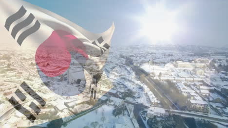 south korean flag waving over snowy town under sun casting long shadows in animated illustration