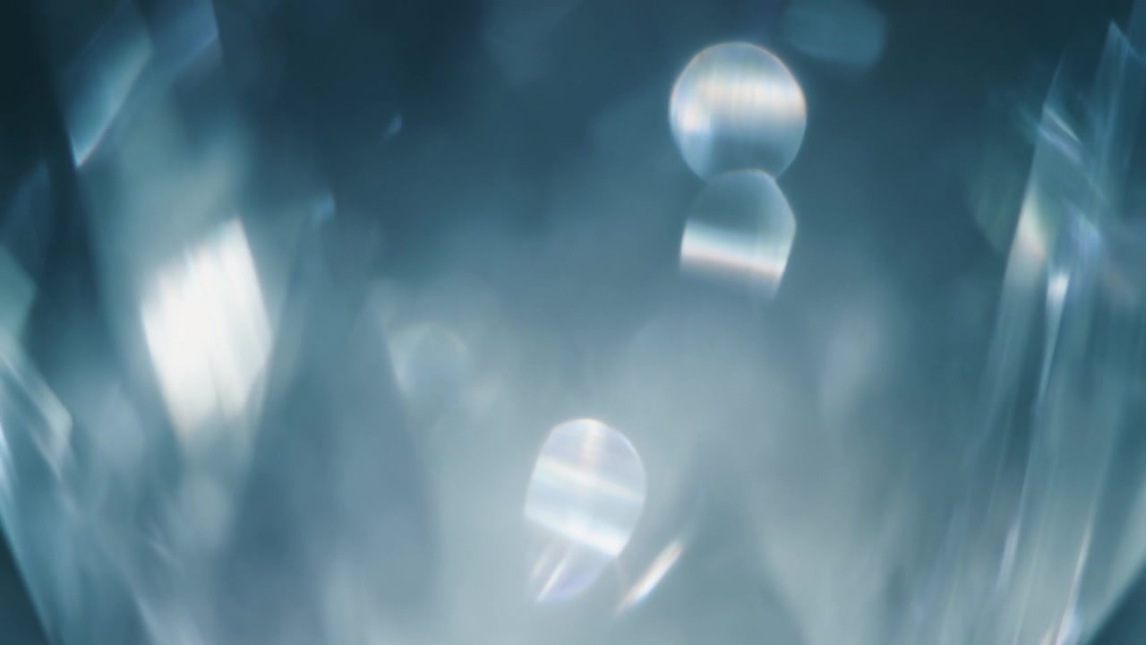 Abstract Background of Shimmering Crystal Light Refractions