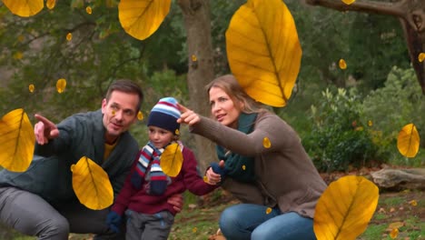 Animación-De-Hojas-De-Otoño-Cayendo-Sobre-Una-Feliz-Familia-Caucásica-En-El-Parque