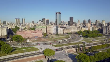 aerial static shot of the traffic beside casa rosada and downtown buenos aires