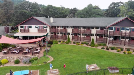 4k drone video of mountainside resort at little switzerland, nc on summer day-7