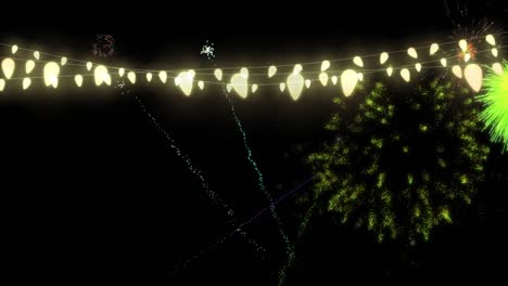 animación de luces de hadas con fuegos artificiales de navidad y año nuevo explotando en el cielo nocturno