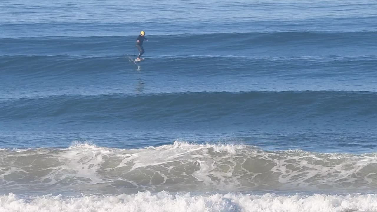Surfing ocean sea waves board water sport wave riding in Portugal Europe