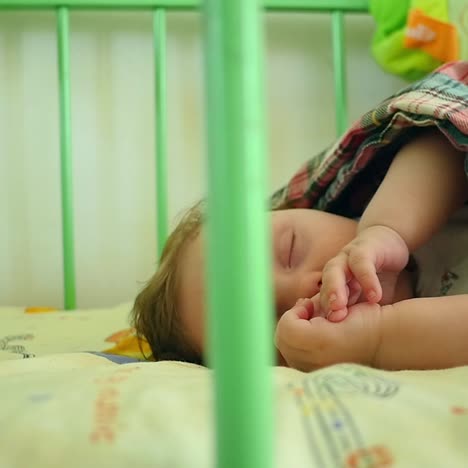 baby sleeping in crib