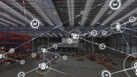 animation of icons connected with lines over aerial view of warehouse