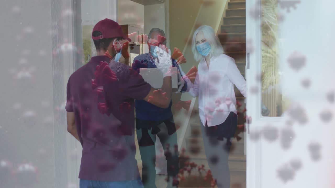 페이스 마스크를 착용한 고령 백인 부부에게 바이러스 세포의 애니메이션