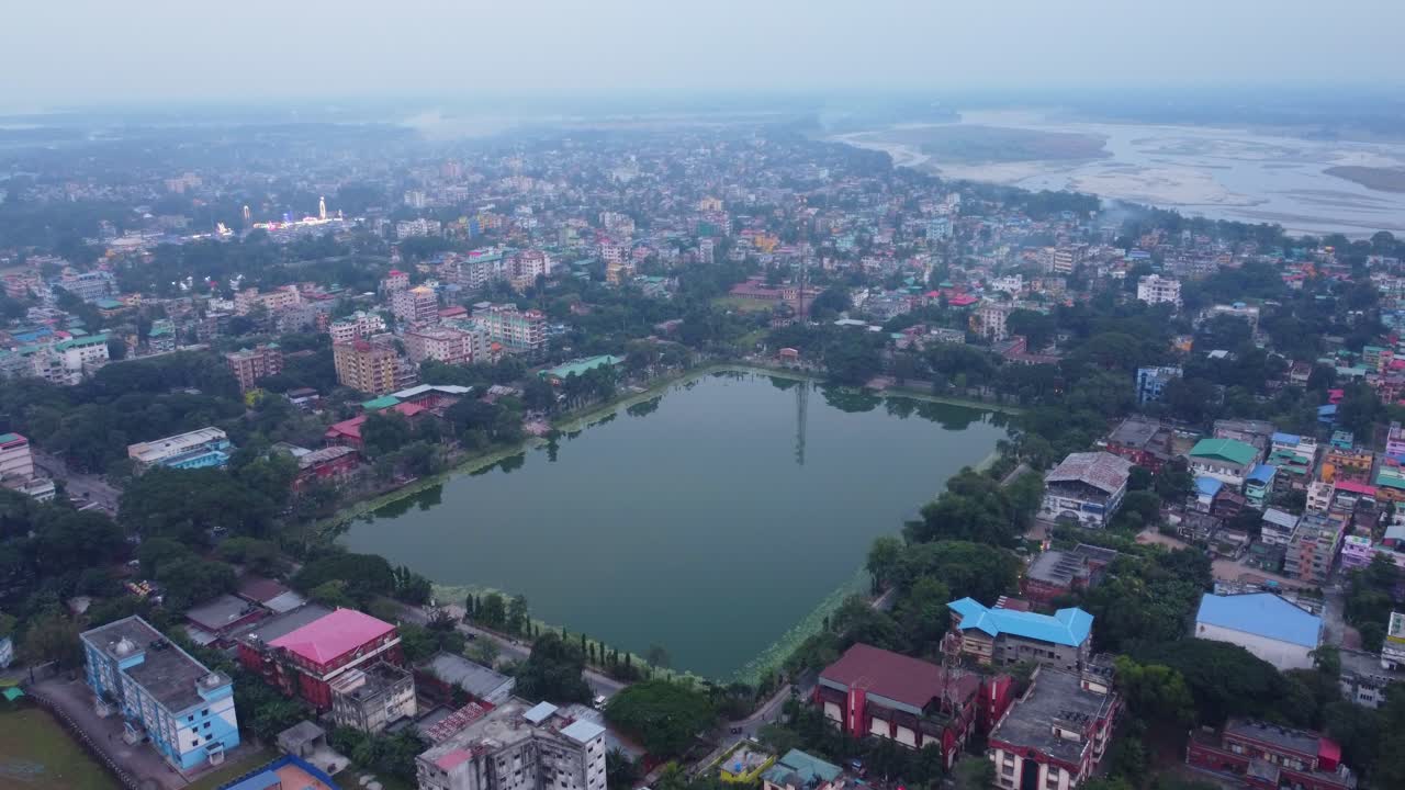 Cooch Behar city landscape on the bank of River Torsa on the foothills of Eastern Himalayas, West Bengal, Aerial shot