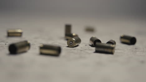 9mm handgun shell casing on the floor