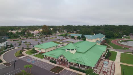 Reverse-aerial-flyover-of-the-charming-and-quaint-city-of-Ocoee-town-hall-in-Central-Florida-with-nobody-outside