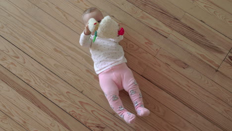 baby girl playing on the floor