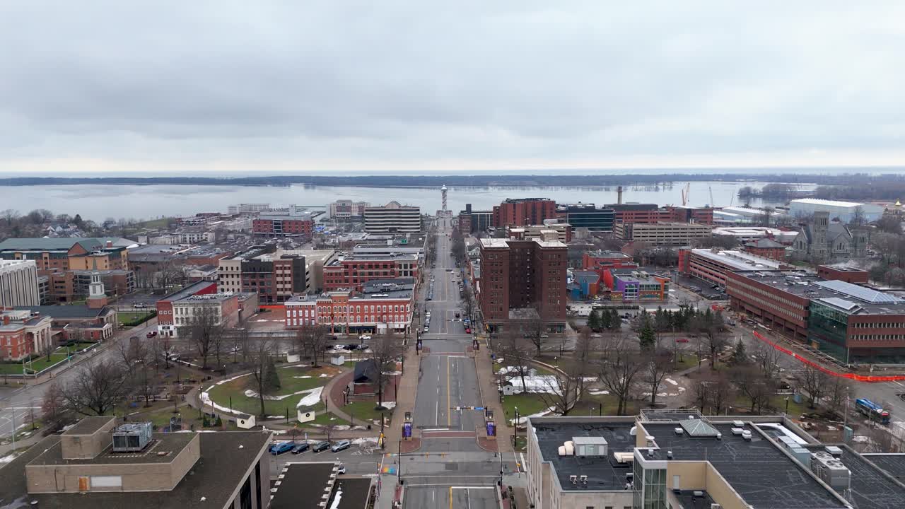 Static aerial of State Street in the winter in Downtown Erie, PA with the Bayfront in the background.