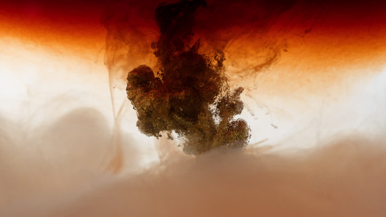 la tinta que brota cayendo a través de nubes de humo líquido en super slomo, las partículas de tinte de polvo se fusionan