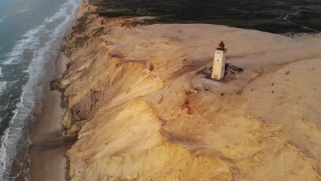 lighthouse in rubjerg, northern denmark. 4k drone footage