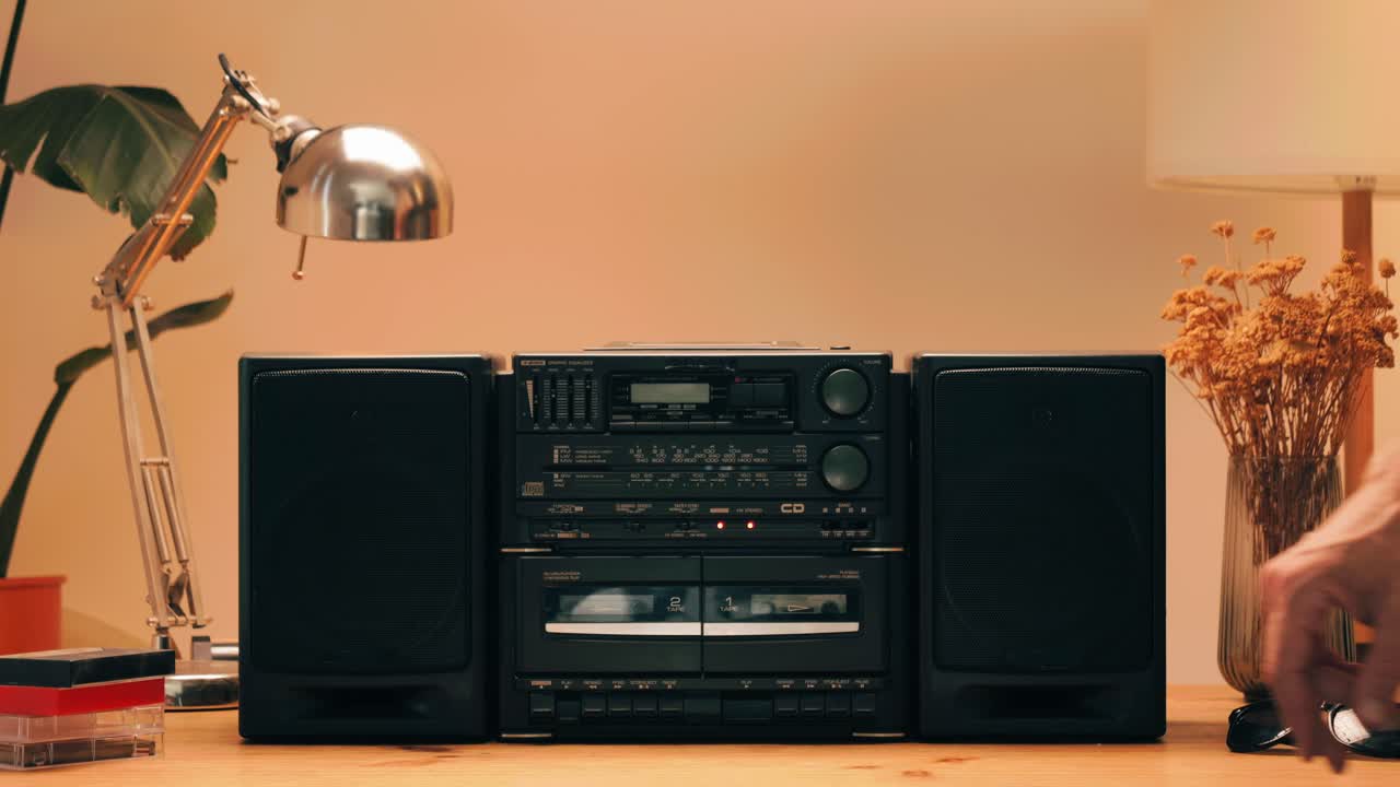Retro radio tape recorder, audio cassette close-up. Listening to music, old radio boom box player, macro of vintage music listening. . High quality 4k footage