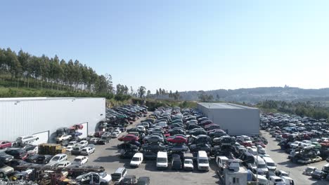 Aerial-view-of-a-junkyard-and-large-group-of-wrecked-cars