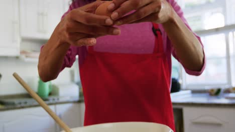 woman making christmas cookies at home