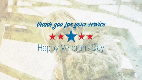 Animation-of-happy-veterans-day-thank-you-text-over-male-soldier-aiming-gun