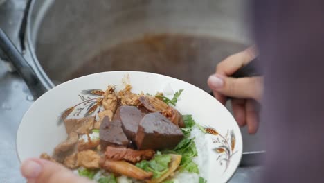 thai-chinese style boiled rice soup and side dishes