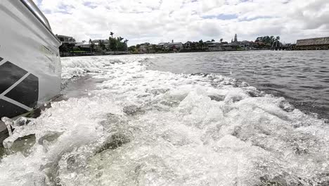 speedboat cruising through nerang river waters