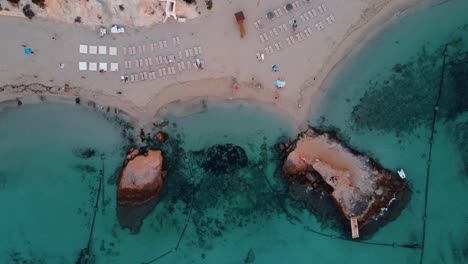 Aerial-drone-top-shot-of-Cala-Tarida,-Ibiza-cala-Tarida