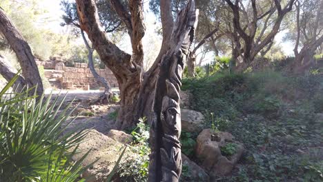 a carved tree in the middle of the tipaza forest - algeria