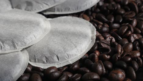 pile of filter coffee pods and roasted  beans 4k video