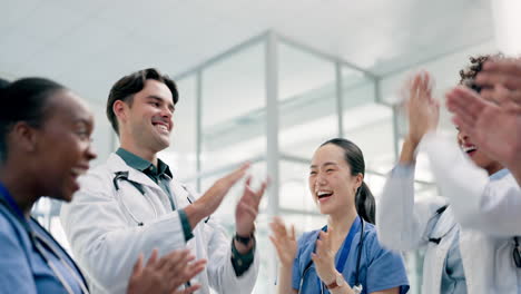 teamwork, celebration and doctors clapping