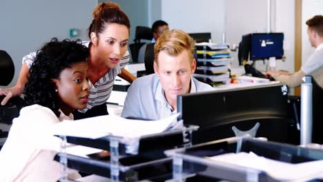 executives working together at the desk q