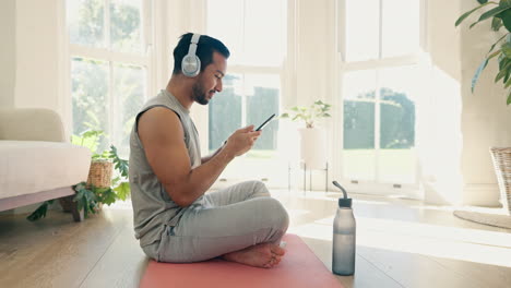 man, meditation and headphones for home fitness