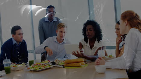 discussing business, team having lunch with animation of abstract light patterns
