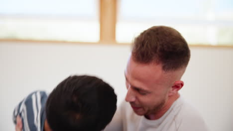 Love,-flying-and-father-with-boy-child-on-a-bed