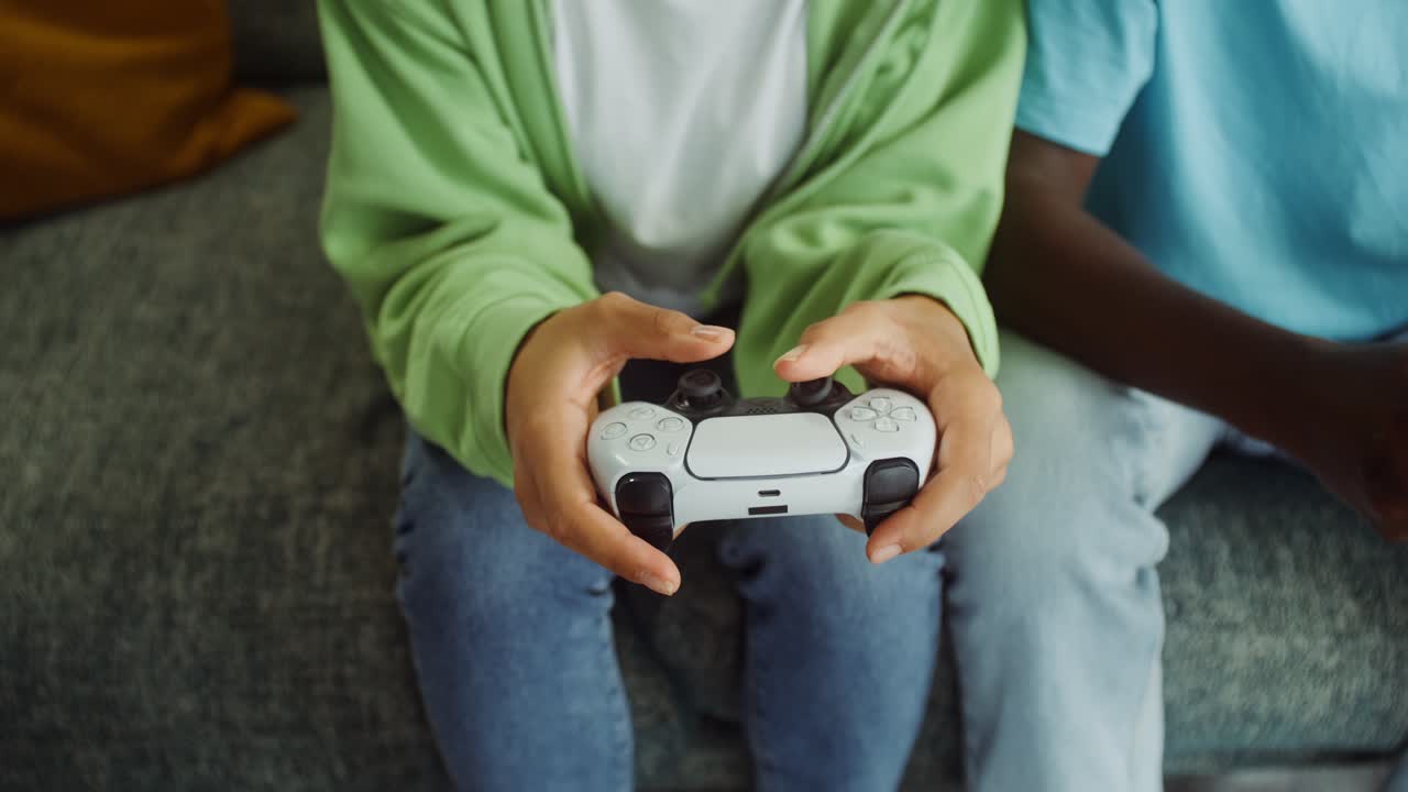 People playing video game with a controller