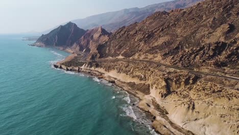 flight over sea the landscape of coast beach shore rocky mountain nature tropical climate view campsite near the sea luxury resort water sport marine adventure trip to qatar iran border island hormuz