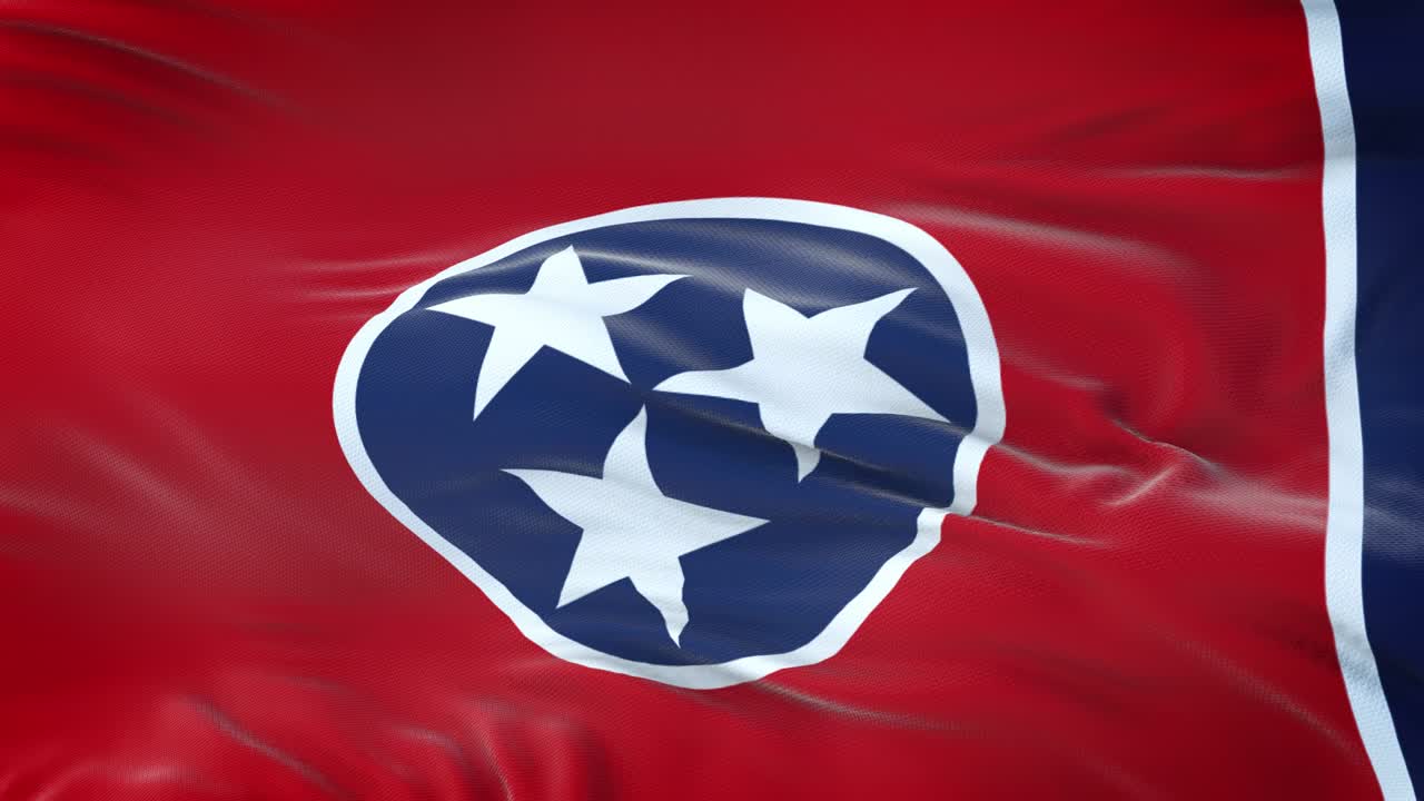 la bandera de tennessee (estado de los estados unidos) ondeando en el viento con una textura de tela muy detallada. bucle sin costuras
