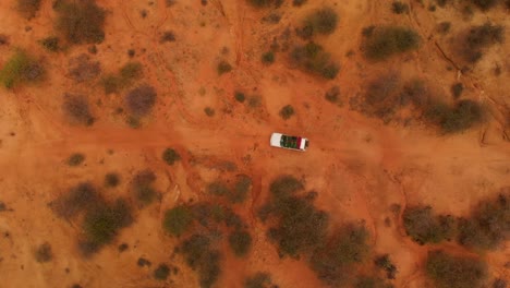 a 4x4 offroad car driving through samburu land in northern kenya