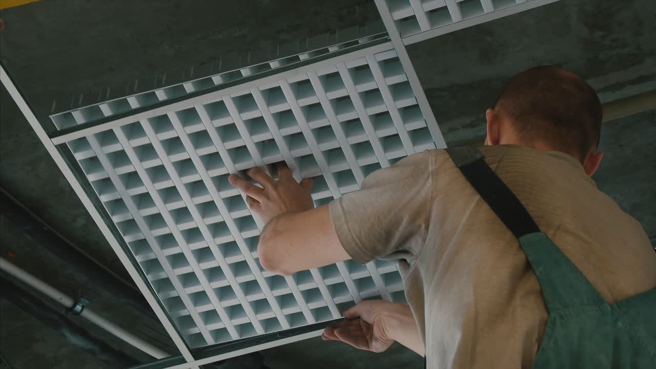 Installing a Commercial Ceiling Tile