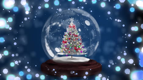 animación del globo de nieve de navidad con árbol de navidad sobre fondo azul