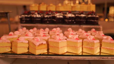 Pastry-cake-cutting-pieces-display,-Cake-cut-into-cubes-on-display