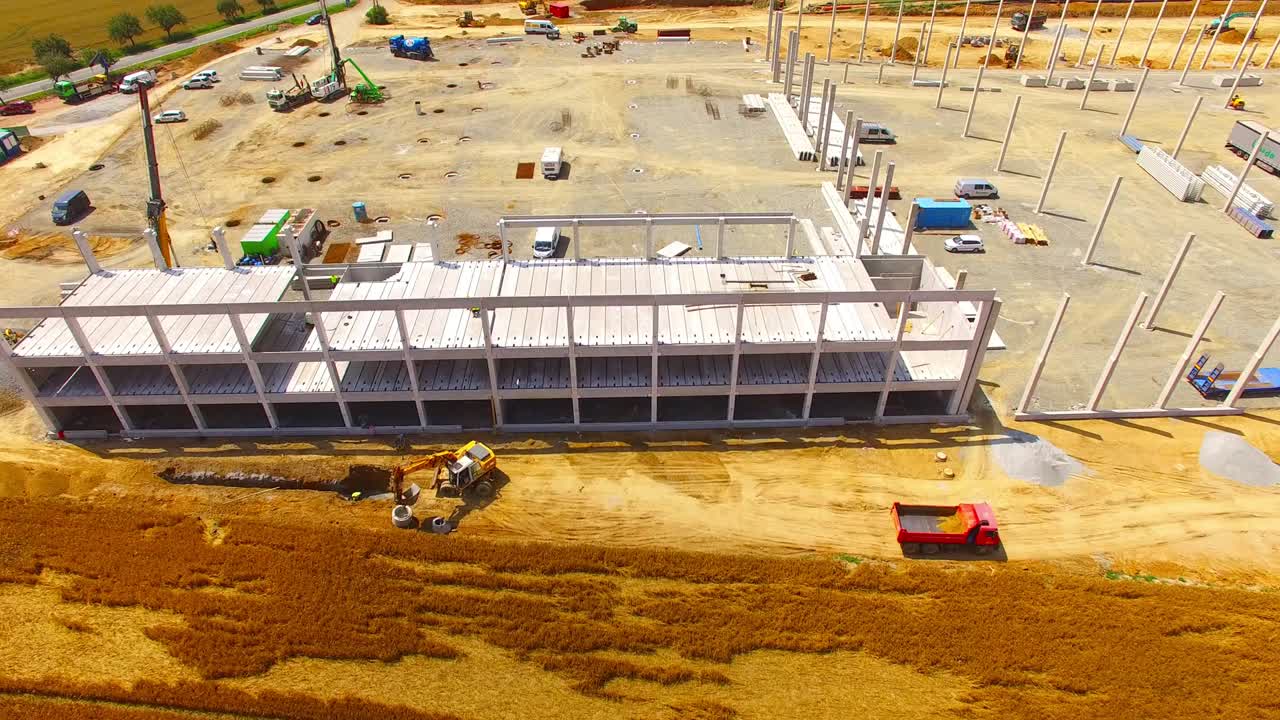 Aerial view of construction site. Industrial theme from drone. Industry, development and investment in European Union.