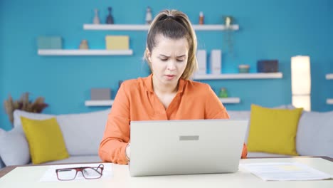 Sick-young-business-woman-working-in-her-home-office.