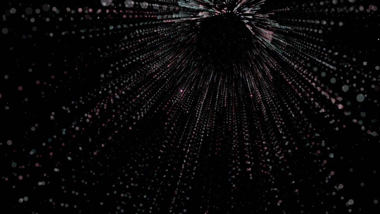 Abstract spreading multi colored glowing particles in three dimensional space. 4k Resolution.