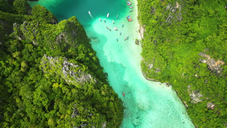 Aerial-View-of-a-stunning-isolated-bay-on-Koh-Phi-Phi-Thailand-turquoise-Pi-Leh-Bay