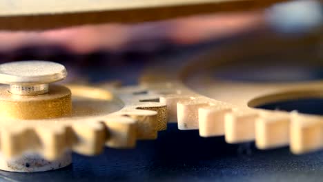 wheels beating time: clock wheels mechanism rolling- macro