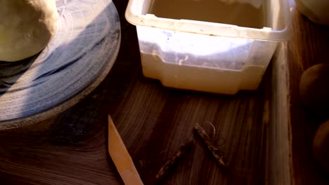 molded clay on pottery wheel