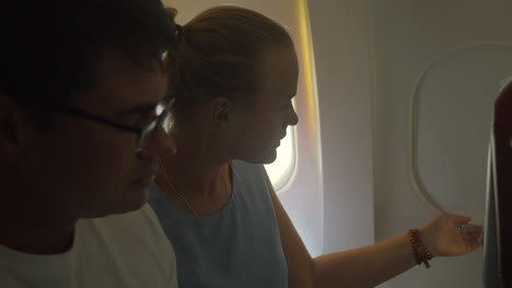 People-Looking-out-the-Plane-Window